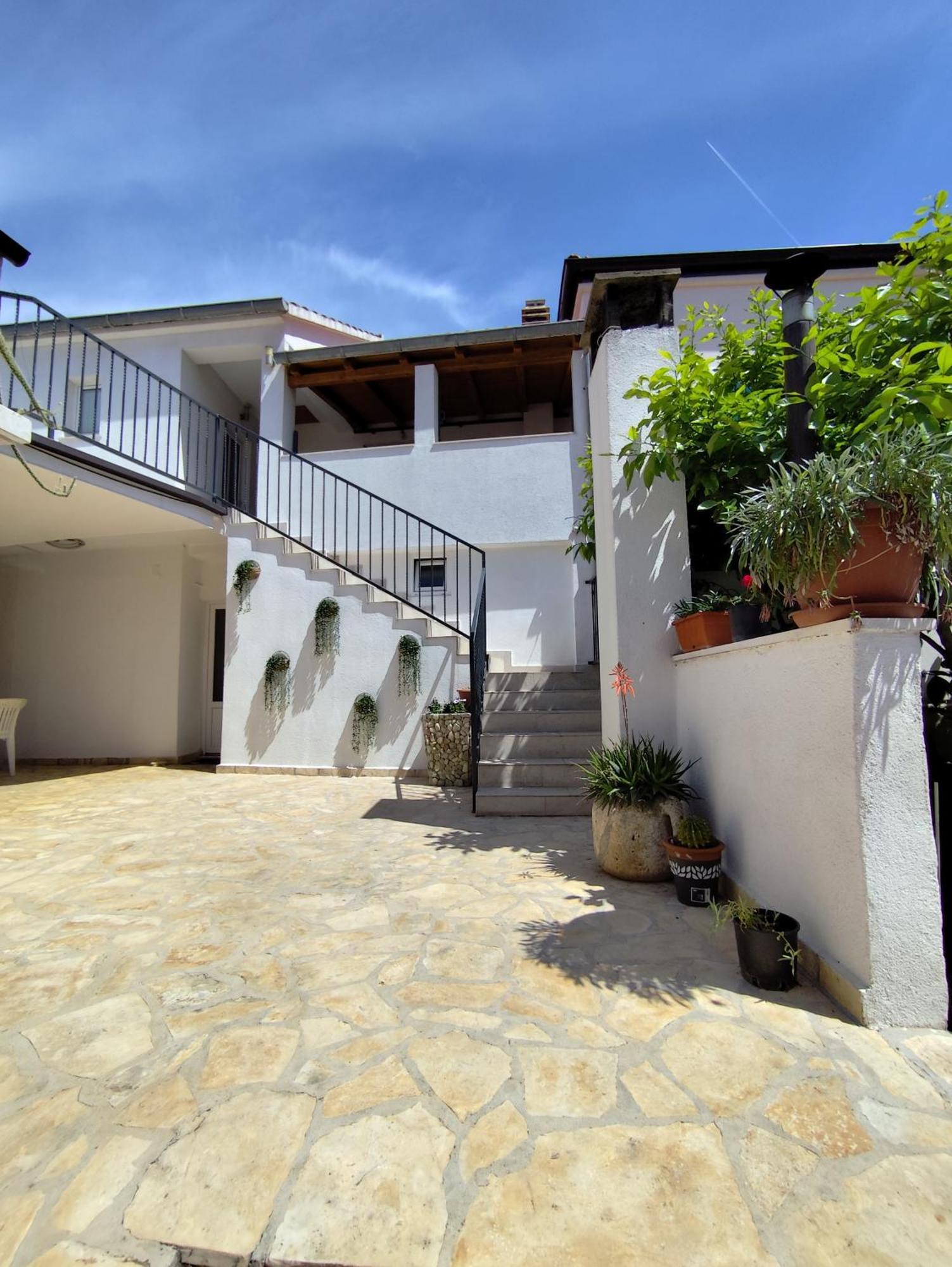 Apartments Milevcic Jelsa  Rom bilde